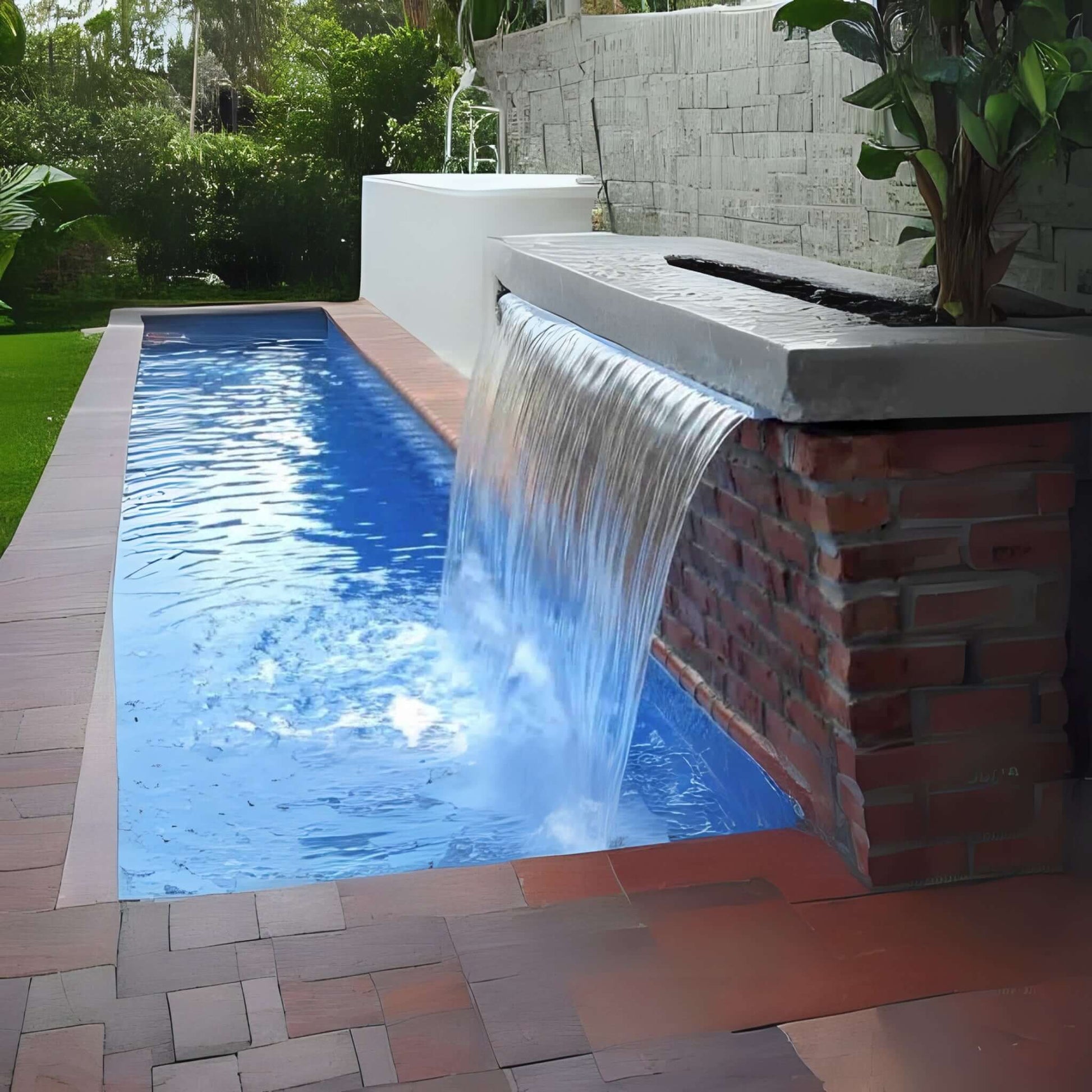 CMP Natural Wonders 72" x 6" Lip White Waterfall | 25577-630-000 cascading into a blue pool, showcasing a modern design.