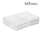FatTowels FT35 Kingsized Velour Beach Towel 36" x 72" folded in white, perfect for SOS Pool and spa essentials.