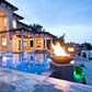 Grand Effects Corinthian Fire Bowl in concrete beside luxury pool, perfect outdoor fire feature, SKU: SOS Pool.