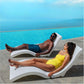 Two people lounging on SwimWays Terra Sol Sonoma Pool Lounge by a blue pool. SKU: SOS Pool.