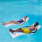 Two people relaxing on SwimWays Terra Sol Sonoma Pool Lounge in a pool, enjoying the SOS Pool experience. SKU: SOS-PB-123.