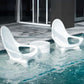 Two TenJam Splash Woosah In-Pool Chairs beside a round table in water, ideal for SOS Pool relaxation. SKU: TenJam Woosah 2 Pack