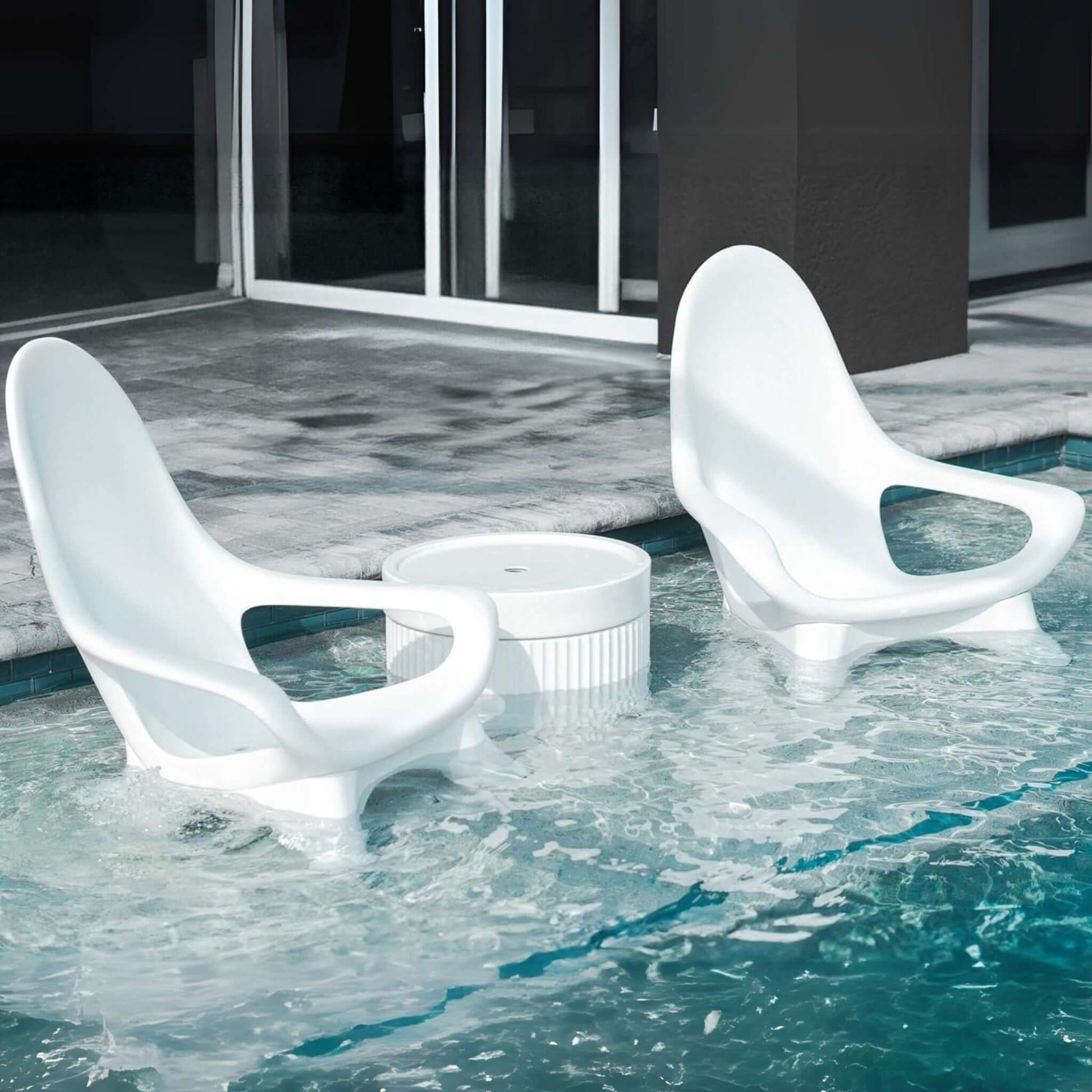 Two TenJam Splash Woosah In-Pool Chairs beside a round table in water, ideal for SOS Pool relaxation. SKU: TenJam Woosah 2 Pack