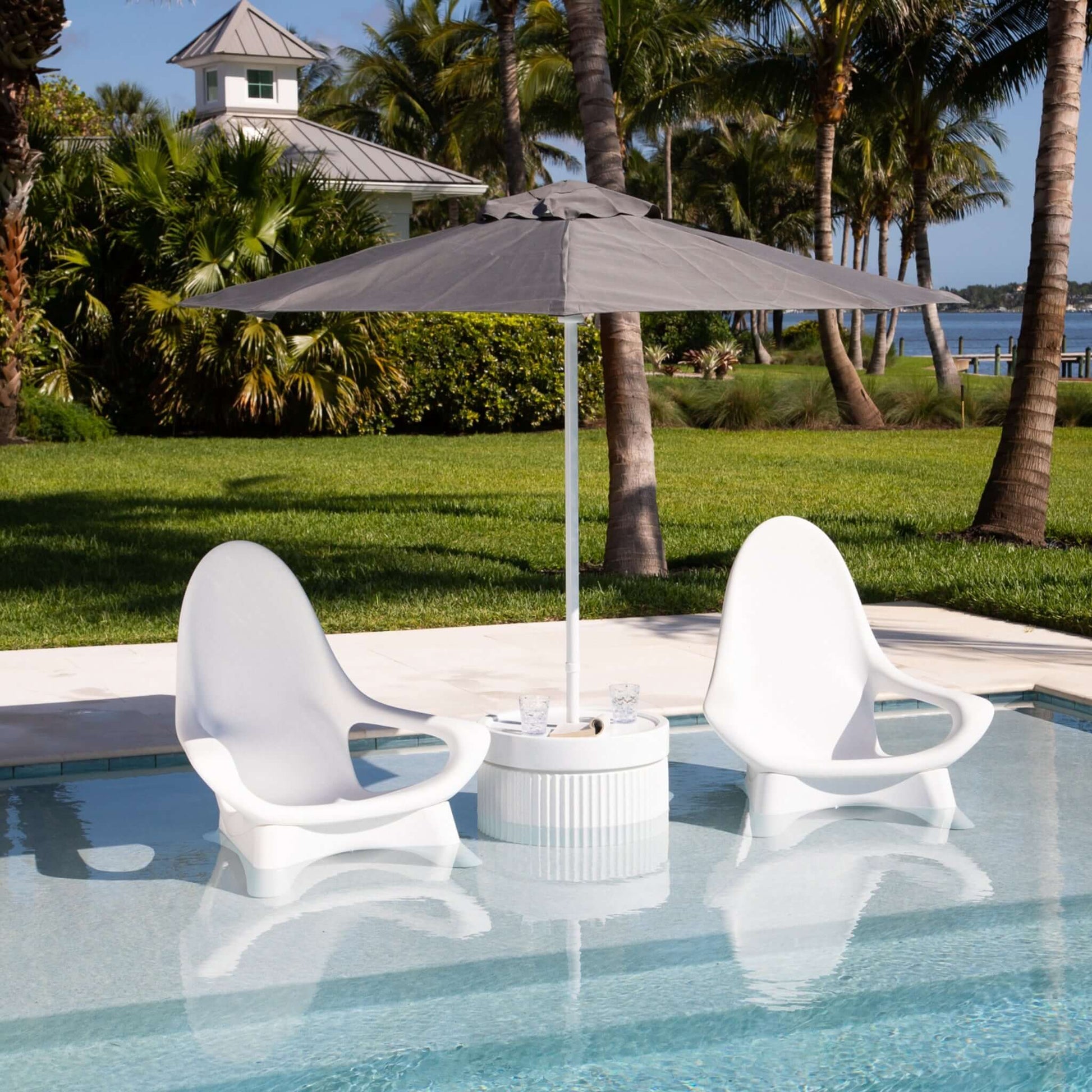TenJam Splash Woosah In-Pool Chair set with umbrella by poolside, perfect for SOS Pool relaxation. SKU: Woosah-2Pack